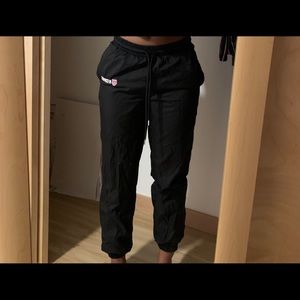 K Swiss wind pants .